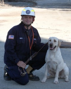 Jagger poses with his handler, Jason Smith